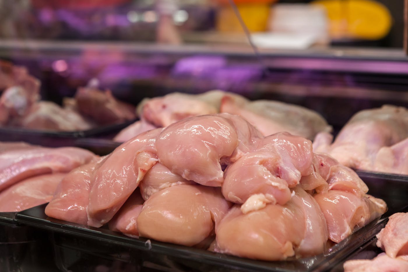Fresh raw bone-in curry cut chicken pieces